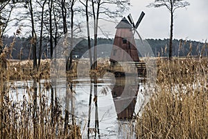 Old windmill on the island of the pond on the Mala Panew river in Kalety Zielona
