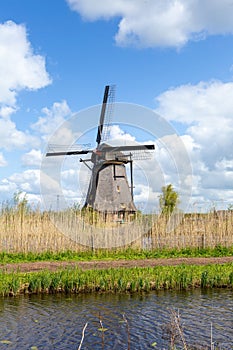 Old windmill in Kinderdijk, part of the world heritage
