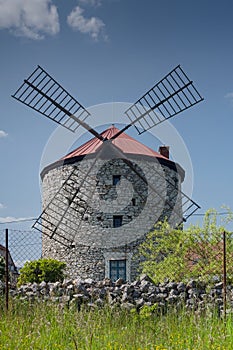 An old windmill located in a village called Ostrov u Macochy.