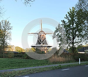 Old Windmill near Barneveld, Gelderland, Nederland in the countryside photo