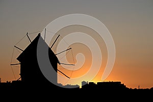 Old windmill sunset cityscape Nessebar