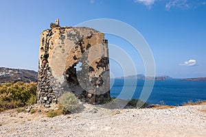 Old windmill with views of caldera, Santorini Island, Greece