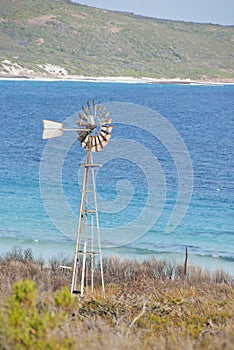 Old windmill on waters edge