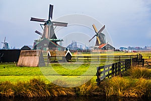 Old windmill in the winter. Village Zaanse Schans, Netherlands.