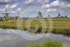 Windmill in Zaan Schans countryside close to Amsterdam photo
