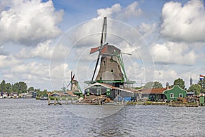 Windmill in Zaan Schans countryside close to Amsterdam photo