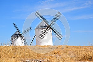 Old windmills in Campo de Criptana  postcard photo.