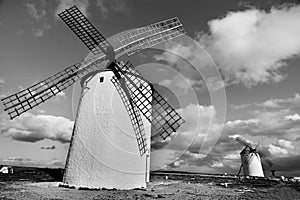 Old windmills in Campo de Criptana, Spain, black and white photo