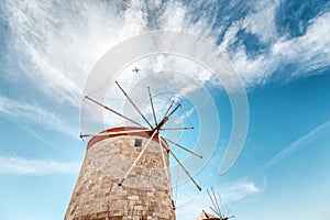 old Windmills in the Mandraki port of Rhodes, Greece