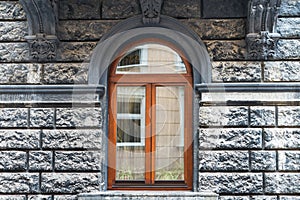 Old window on ancient wall