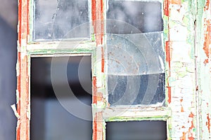 Old window with broken glass