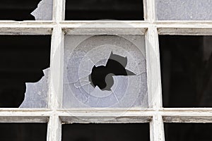 Old window with broken glass