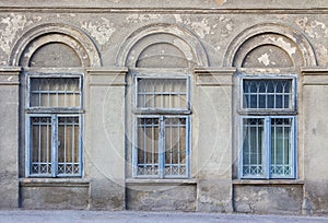 Old window frame on the cracked wall