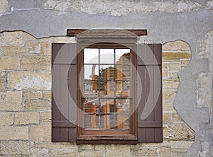 Old window with shutters.