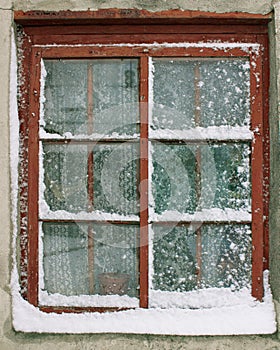 Old window in the snow