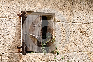Old window in a stone wall