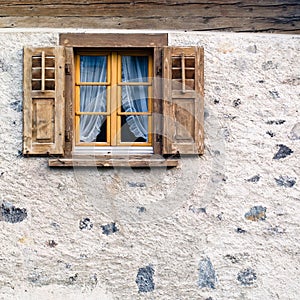 Old window in stone wall