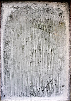 Old window with streaked white paint photo