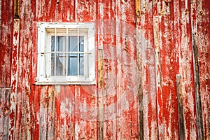 Old window in wooden building