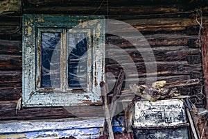 Old window in wooden cottage