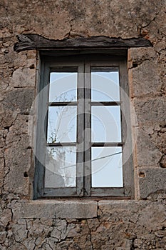 Old window with wooden lintel