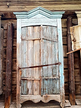 Old window with wooden shutters