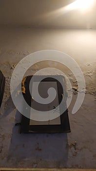 old windows on cracked wall