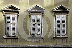 Old windows with shutters