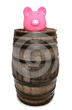 Old wine barrel and piggy bank