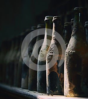 Old wine bottles in row