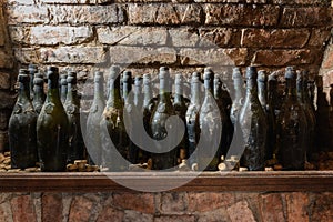 Old wine bottles in the wine cellar