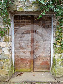 Old wine cellar door to abandoned building