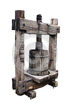 Old winepress on white