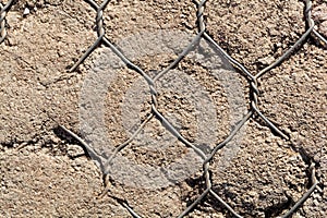 Old wire netting in concrete