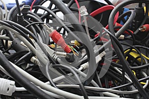 Old wires in a heap. cables chaos