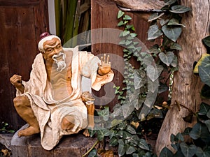 Old wise man statue in the garden