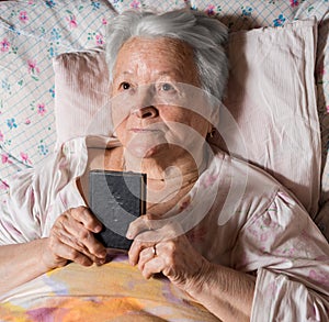 Old woman with Bible