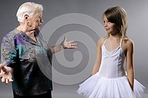 old woman communicating with girl