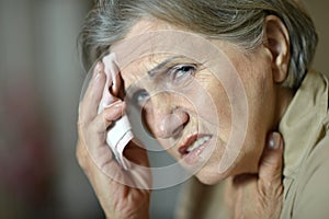 old woman feel unwell