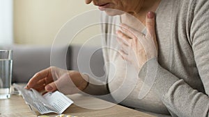 Old woman getting bad after reading pills instruction, dangerous side effects