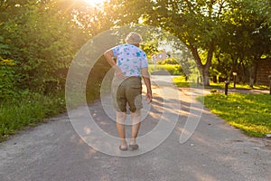 Old woman has back pain. Selective focus.