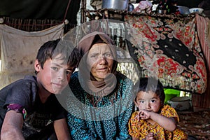 Old woman with her grand sons
