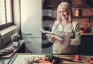 Old woman in kitchen