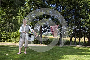 Old woman with laundry basket