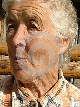 Old woman looking surprised photo