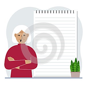 A old woman next to a large notepad or large notebook. The concept of filling a notebook or notepad, writing notes, time