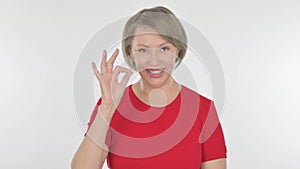 Old Woman with Okay Sign on White Background