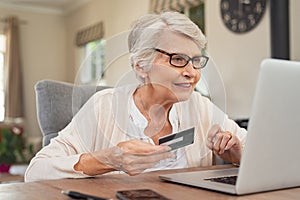 Old woman paying bills online
