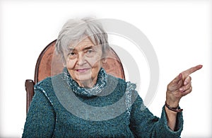 Old Woman Pointing her Finger to Something