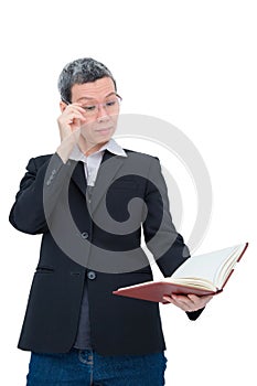 Old woman reading book having problem with her eyes